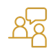 Two people icons with a speech bubble, representing team discussion or communication.